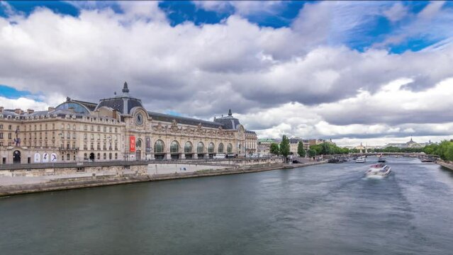 The musee d'Orsay is a museum in Paris timelapse hyperlapse, on the left bank of the Seine. View from Royal bridge. Musee d'Orsay has the largest collection of impressionist paintings. Paris, France