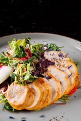 Caesar salad with croutons, cheese, eggs, tomatoes and grilled chicken