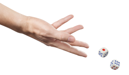 The dice game: hand throwing game cubes, cut out