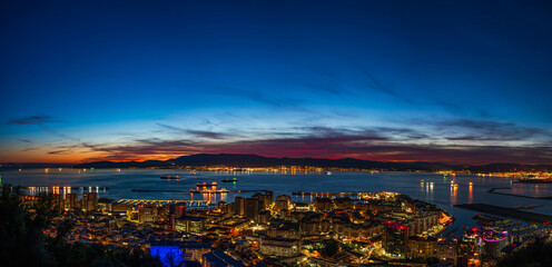 Fototapeta na wymiar Sunset view over Gibraltar - a British Overseas Territory, and Bay of Gibraltar