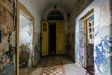 Dark and creepy corridor of old abandoned mental hospital