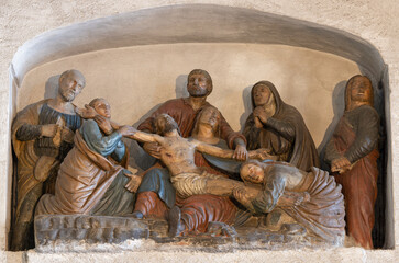 VARENNA, ITALY - JULY 20, 2022: The sculptural group of Deposition in the church Chiesa di San...
