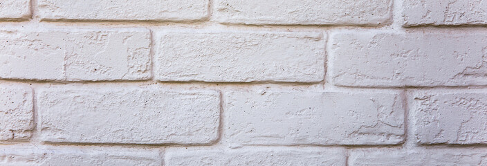 White brick wall background.