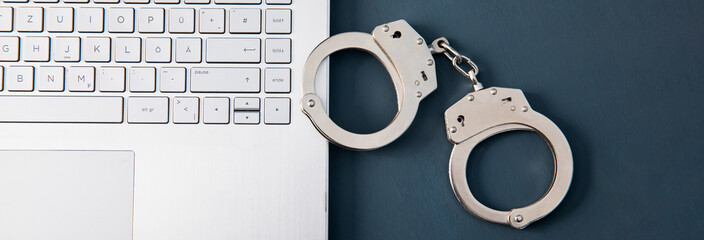 handcuffs on the laptop