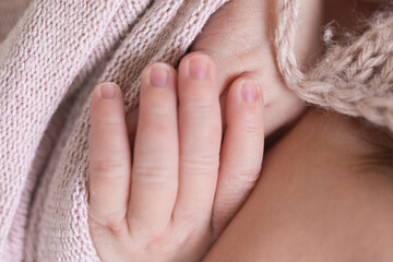 close up of newborn hand and fingernails