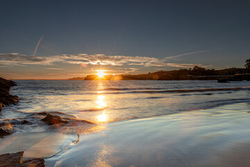 Naklejka premium Amanece en la playa de Candás