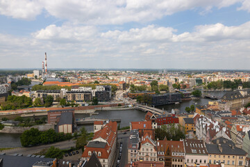 Top aerial view of Wroclaw. City center with colorful houses with red roofs and and river with a bridges, Poland