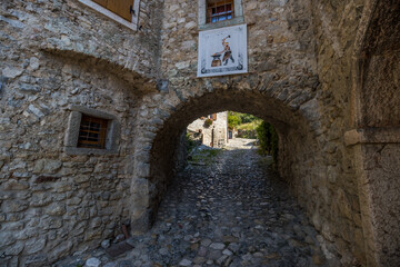 Fototapeta na wymiar Street of the old medieval town of Canale di Tenno on Lake Garda