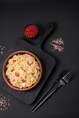 Delicious farfalle pasta with langoustine shrimp with creamy sauce