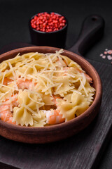 Delicious farfalle pasta with langoustine shrimp with creamy sauce