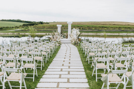 Rows chairs wedding ceremony outside event 
