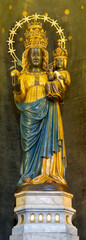BIELLA, ITALY - JULY 15, 2022: The carved polychrome statue of Madonna d’Oropa in Cathedral
