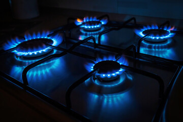 Domestic gas cooker with burners lit