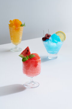frozen fruit pressed shake topped with stevia leaves