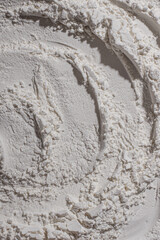 Texture of flour, powder, white sand. White. Bulge, dents, cracks, imprint, crater.
