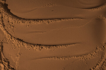 The surface of sand, clay, earth. Wheel dents, tire marks. Craters, depressions, bulges. Mars....