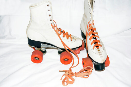 Vintage roller skates with red laces