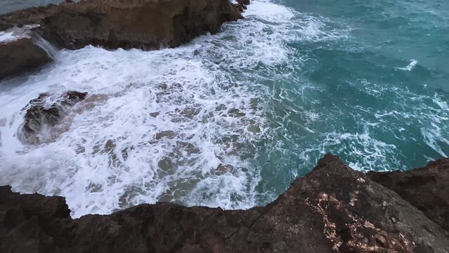 water flowing into the rocks, sea, ocean, water, coast, wave, beach, nature, rock, waves, rocks, landscape, coastline, sky, shore, surf, stone, travel, summer, island, storm, seascape, bay, cliff, roc