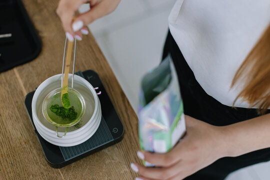 Woman Preparing Organic  matcha Tea