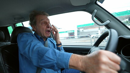 One senior man scratching face while driving in city. Older person commuter scratches nose drives on road
