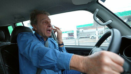 One senior man scratching face while driving in city. Older person commuter scratches nose drives on road