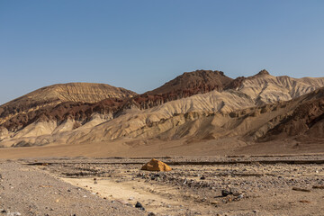 Scenic view of colorful geology of multi hued Amargosa Chaos rock formations in Death Valley National Park, Furnace Creek, California, USA. Barren desert landscape of Artist Palette in Black mountains