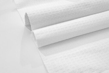 White textured cotton fabrics swatches on light background.Textile Mockup. Towel	