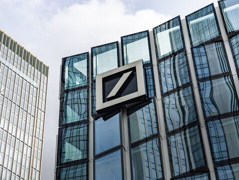 FRANKFURT, GERMANY - 20. March 2023: Deutsche Bank logo sign on an office building facade. Exterior of the German investment bank in the financial district. Big employer in the finance industry.
