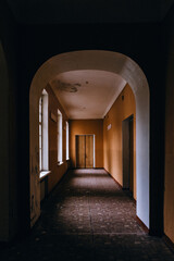 Dark dirty corridor of old abandoned school