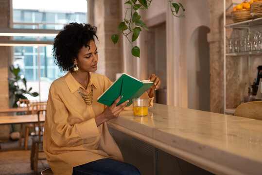 Pensive Restaurant Owner checking schedule