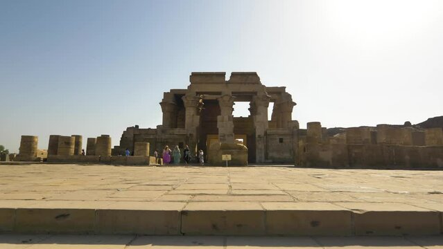 2022 - Ascending view of tourists walking into Egypt's Temple of Kom Ombo.