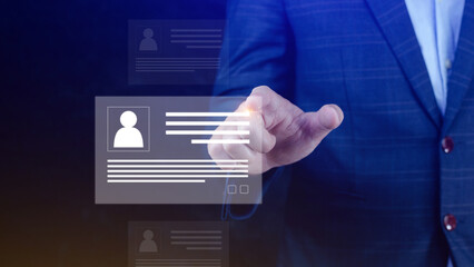 Human resources manager choosing professional profile to hire on virtual screen interface, recruitment concept. Businessman hand pointing icon resource (HR) management concept