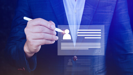 Human resources manager choosing professional profile to hire on virtual screen interface, recruitment concept. Businessman hand pointing icon resource (HR) management concept