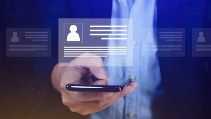 Human resources manager choosing professional profile to hire on virtual screen interface, recruitment concept. Businessman hand pointing icon resource (HR) management concept