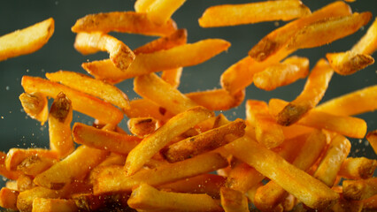 Freeze Motion Shot of Falling Fresh French Fries, Close-up