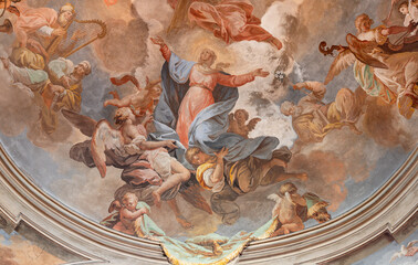 DOMODOSSOLA, ITALY - JULY 19, 2022: The baroque fresco of Assumption in cupola of the church Chiesa...