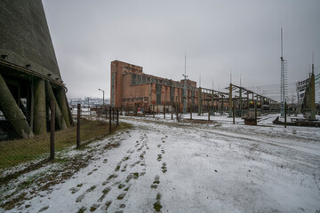 Fototapeta premium The abandoned Inota power plant - a former thermal power plant located in the town of Inota, Hungary