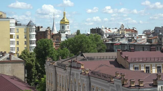 2022 - establishing shot rooftops of downtown Kyiv, Ukraine with St. Sophia's bell tower distant.