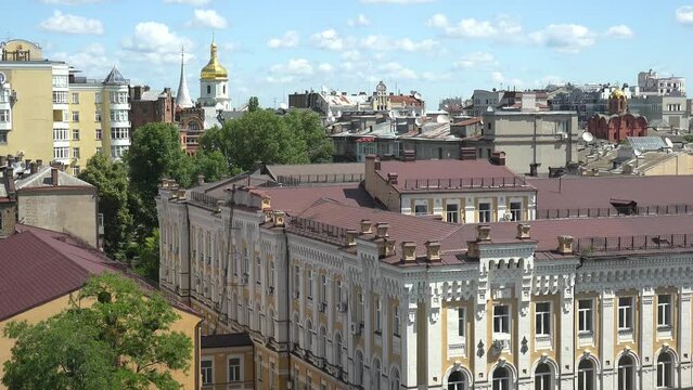 2022 - establishing shot rooftops of downtown Kyiv, Ukraine with St. Sophia's bell tower distant.