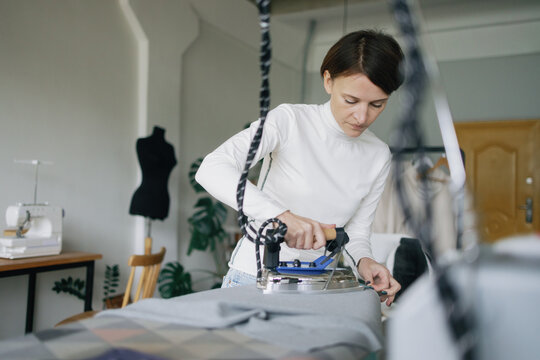 Dressmaker office. Smoothing iron. Interior. Preparation
