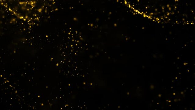 Gold dust particles fly in slow motion in the air lingering slowly. Dust Particles Background Bokeh Lights Background on Black Background 4k Footage Snow Particles Background.