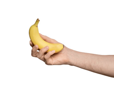 Ripe yellow banana in male hand - Powered by Adobe