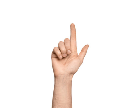 Man's hand shows index finger up, presses something