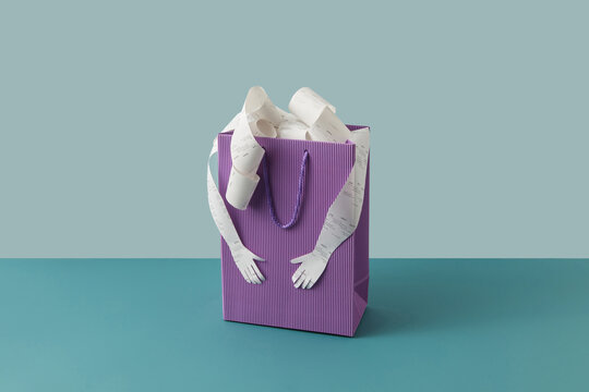 Pay receipts in shopping bag with paper hands.