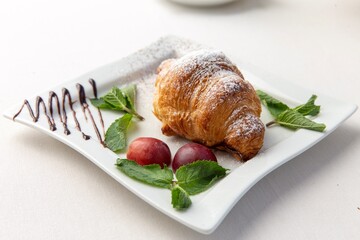 desert with coffee and croissant