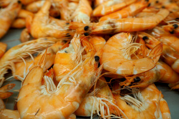 close up large boiled orange shrimps side view.  market supermarket seafood .kitchen cook