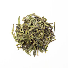 A bunch of chinese green tea,  isolated on a white background, close up. Long Jing Cha Tea use for weight loss, caffeine alternative and improving heart health.