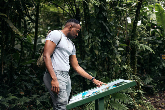 Man looking at a map of the jungle national park
