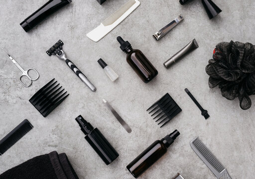 Set of various grooming and shaving tools on table