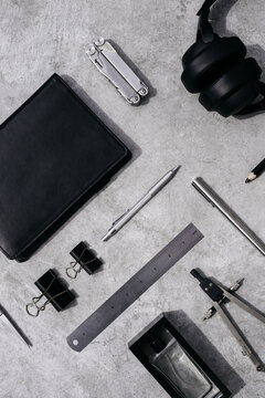 Set of various black color men stuff tools on table